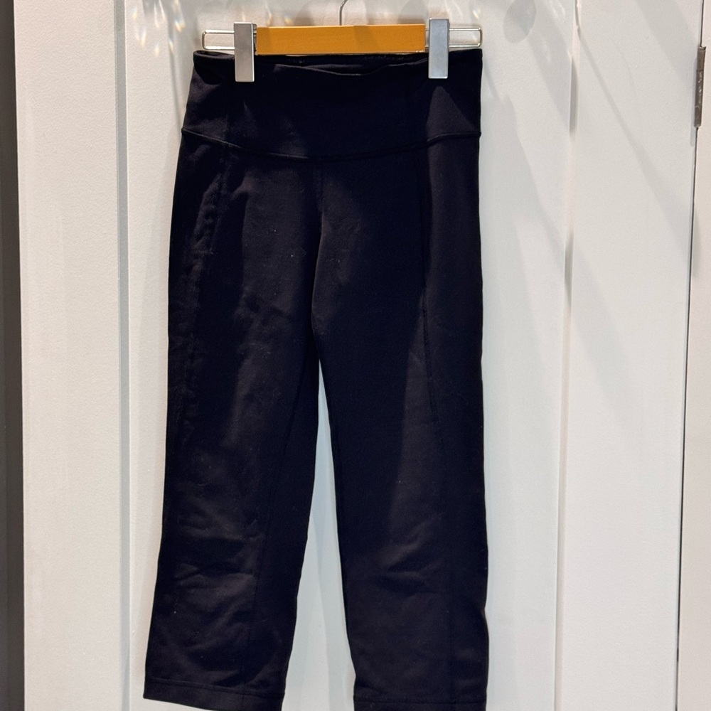 Lululemon Black Flared Capri Yoga pants - size 2 side slit